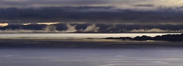 Panoramic view of dawn breaking across the sound of Rsay and the Isle of Rona taken