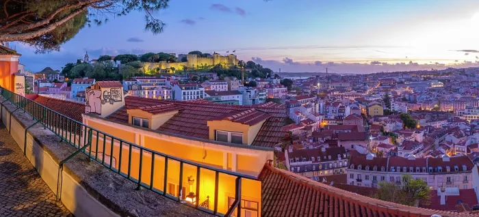 Framed Print : Panoramic view of Lisbon Castle from Miradouro da Senhora do Monte scenic point at dusk in the Alfama District, Lisbon, Portugal, Europe