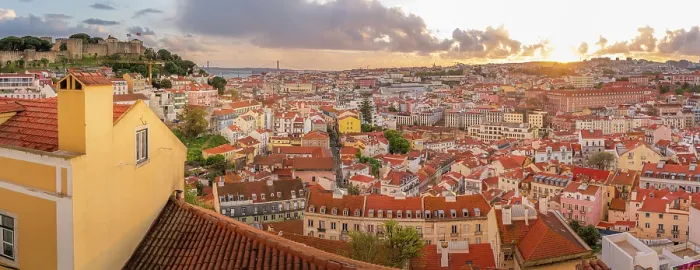 Framed Print : Panoramic view of Lisbon Castle from Miradouro da Senhora do Monte scenic point at sunset in the Alfama District, Lisbon, Portugal, Europe