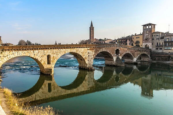 Panoramic view of Ponte Pietra bridge in Verona on Adige river, Veneto region, Italy