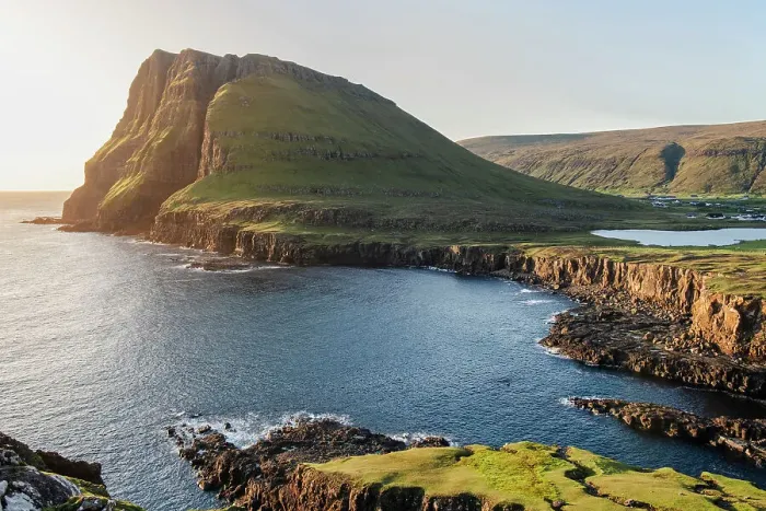 Framed Print : A panoramic view of a rugged coastal landscape of Suduroy in the Faroe Islands, Denmark, Atlantic, Europe Framed Print : A panoramic view of a rugged coastal landscape of Suduroy in the Faroe Islands, Denmark, Atlantic, Europe