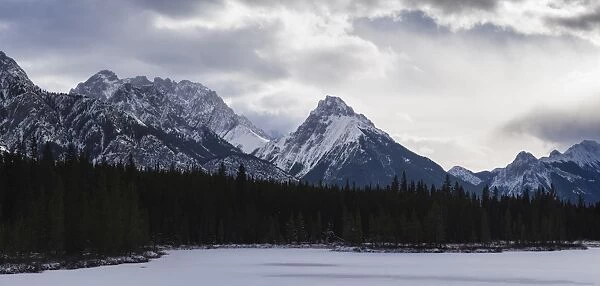 Panoramic winter landscape of the Canadian Rocky Mountains at the Lower Kananaskis Lake