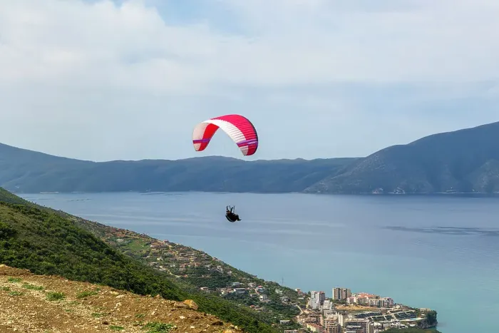 Framed Print : Paraglider taking off from mountainside above the Adriatic Sea at Vlore, Albania, Europe Framed Print : Paraglider taking off from mountainside above the Adriatic Sea at Vlore, Albania, Europe