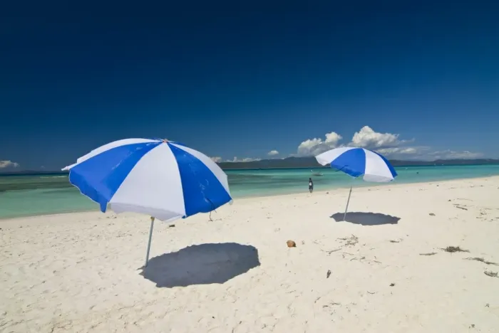 Framed Print : Parasols at the beautiful beach in Nosy Iranja, a little island near Nosy Be Framed Print : Parasols at the beautiful beach in Nosy Iranja, a little island near Nosy Be