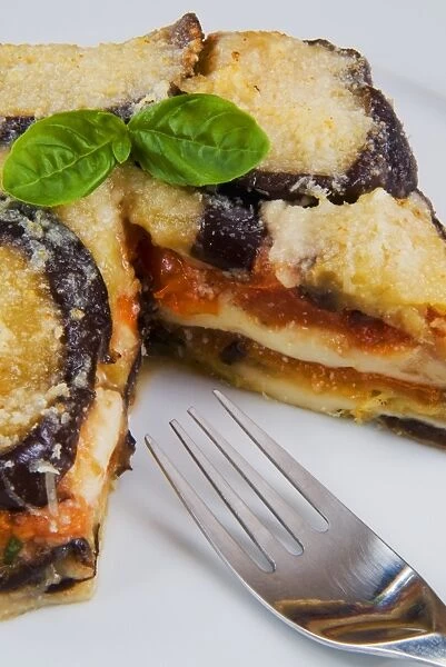 Parmigiana di melanzane, an Italian dish made with a shallow-fried sliced filling, layered with cheese and tomato sauce, Italy, Europe