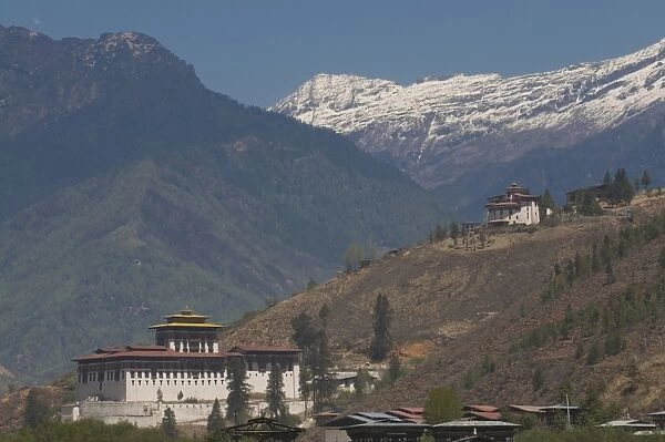 The Paro Tsong, old castle, with the Himalaya mountains in the background, Bhutan, Asia
