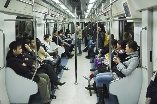 Passengers on the Beijing subway, Beijing, China, Asia