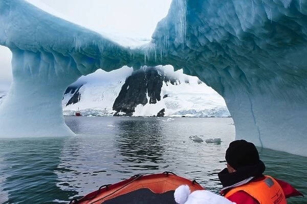 Passengers exploring icebergs near Pleneau Island, Antarctica, Polar Regions
