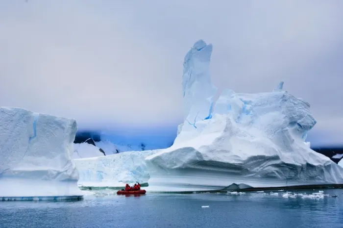 Framed Print : Passengers exploring icebergs near Pl?neau Island, Antarctica, Polar Regions Framed Print : Passengers exploring icebergs near Pl?neau Island, Antarctica, Polar Regions