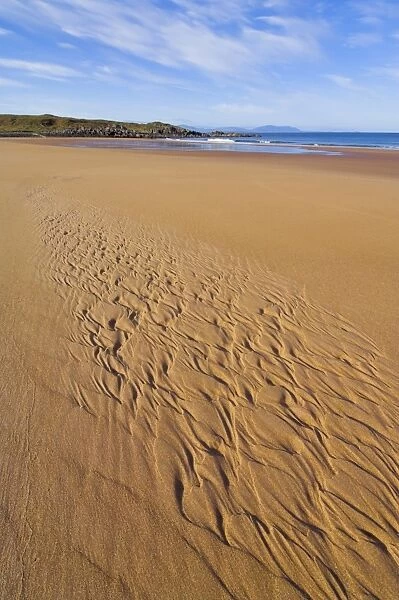 Patterns in the sand at Redpoint sandy beach