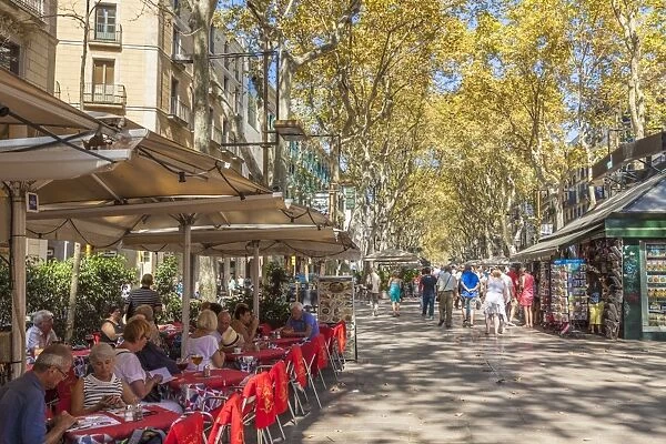 Pavement cafe restaurant on La Rambla (Las Ramblas) boulevard the promenade through Barcelona
