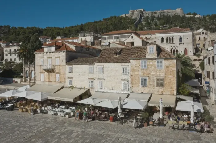 Framed Print : Pavement cafes in the main square overlooked by the ancient fortress, in the medieval city of Hvar, island of Hvar, Dalmatia, Croatia, Europe Framed Print : Pavement cafes in the main square overlooked by the ancient fortress, in the medieval city of Hvar, island of Hvar, Dalmatia, Croatia, Europe