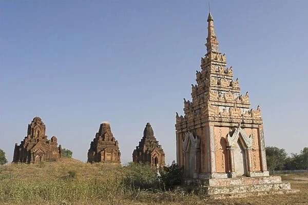 Payathonzu complex of three brick shrines with sikara that are interconnected