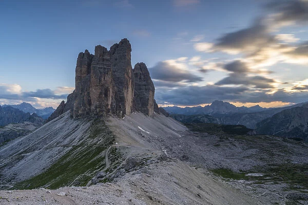 The Three Peaks of Lavaredo from Forcella Lavaredo at sunset in summer. Sesto Dolomites