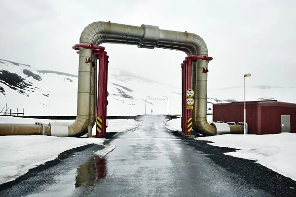 Peculiar pipework built over the road, Krafla Power Station, is the largest Geothermal
