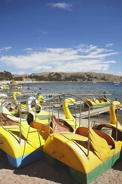 Pedaloes on beach, Copacabana, Lake Titicaca, Bolivia, South America