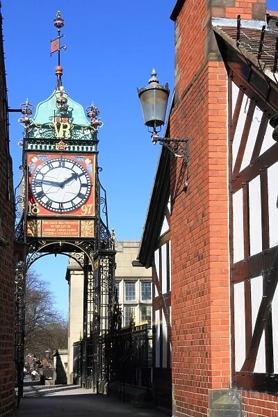 Pedestrian bridge over Eastgate, with clock, Chester, Cheshire, England, United Kingdom, Europe