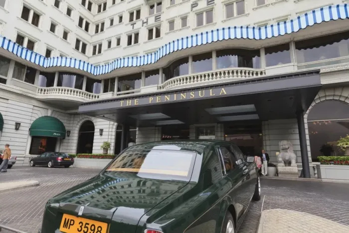 Framed Print : The Peninsula Hotel and one of the hotels fleet of green Rolls Royces Framed Print : The Peninsula Hotel and one of the hotels fleet of green Rolls Royces