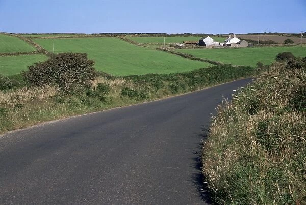 Penwith farm landscape and road near Lanyon Quoit, Cornwall, England, United Kingdom