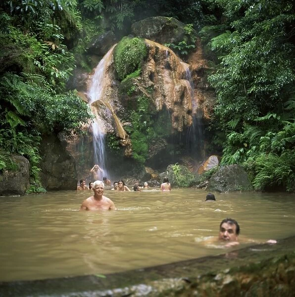 People bathing in volcanic pool