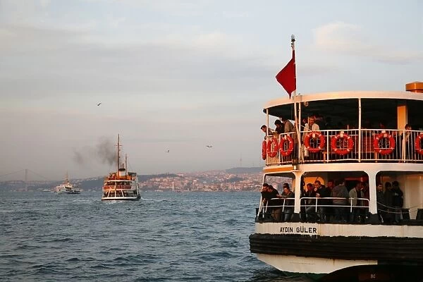 People on the boat crossing the Bosphorus, Istanbul, Turkey, Europe