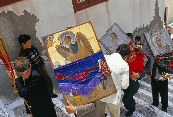 People carrying icons during the celebration of Lambri Triti