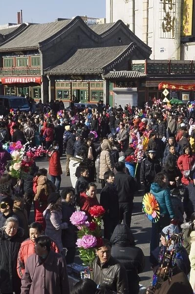 People crowding the street at Changdian Street Fair during Chinese New Year