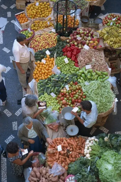 Framed Print : People at a fruit and vegetable stall in the market hall in Funchal Framed Print : People at a fruit and vegetable stall in the market hall in Funchal