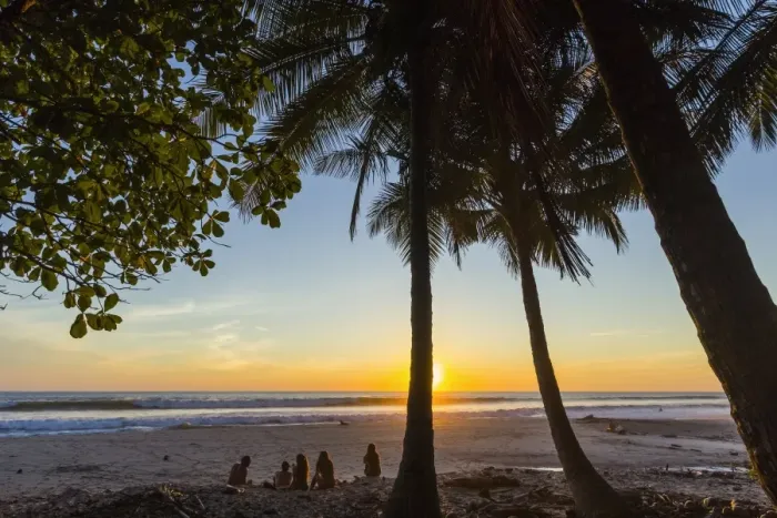 Framed Print : People by palm trees at sunset on Playa Hermosa beach, far south of the Nicoya Peninsula Framed Print : People by palm trees at sunset on Playa Hermosa beach, far south of the Nicoya Peninsula