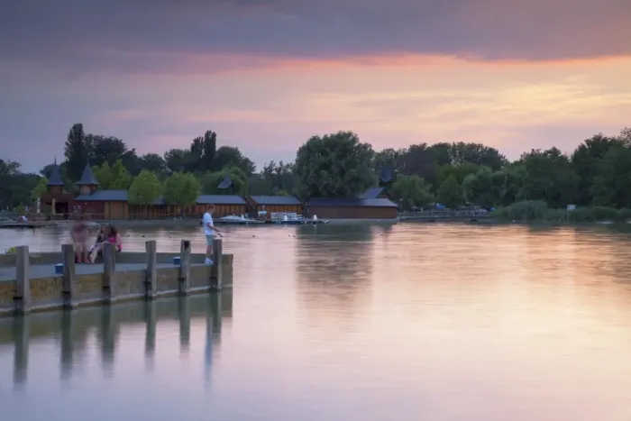 Framed Print : People on pier at sunset, Keszthely, Lake Balaton, Hungary, Europe Framed Print : People on pier at sunset, Keszthely, Lake Balaton, Hungary, Europe