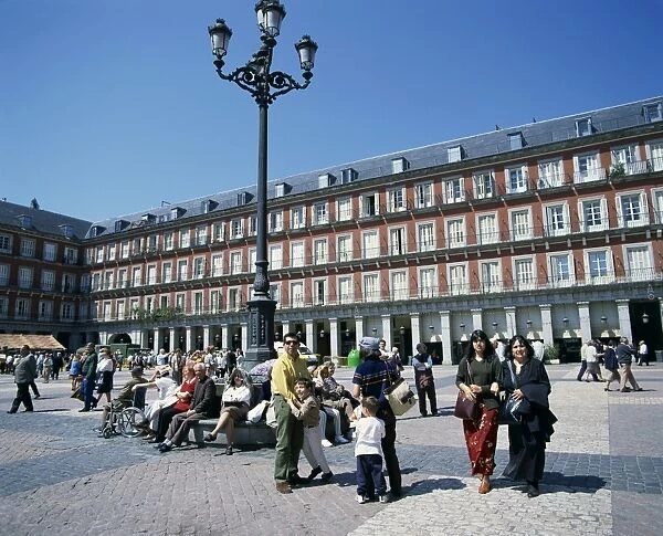 People at a popular meeting point in the Plaza Mayor in Madrid
