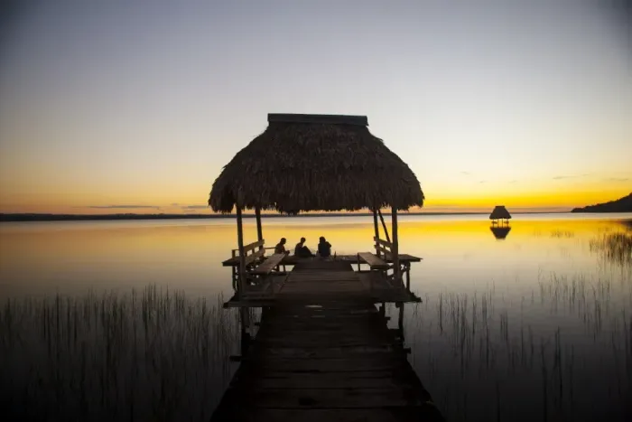 Framed Print : People relaxing at sunset, Lago Peten Itza, El Remate, Guatemala, Central America Framed Print : People relaxing at sunset, Lago Peten Itza, El Remate, Guatemala, Central America