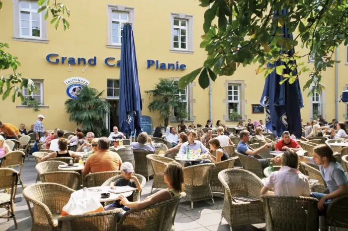 Framed Print : People sitting at an outdoor cafe on Karlsplatz Framed Print : People sitting at an outdoor cafe on Karlsplatz