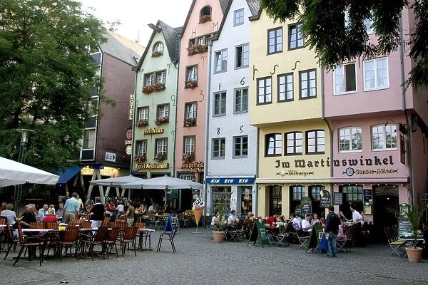 People sitting at outdoor restaurant in the old town