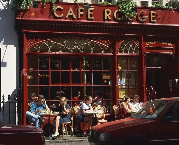 People sitting outside Cafe Rouge, Soho, London, England, United Kingdom, Europe
