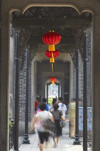 People walking along corridor at Chen Clan Academy, Guangzhou, Guangdong, China, Asia