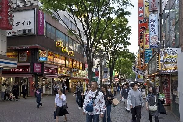 People walking in the famous Kabukicho entertainment district in East Shinjuku