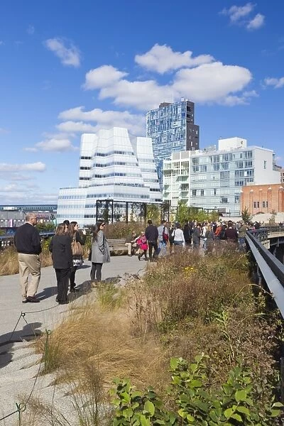People walking on the High Line, a one mile New York City park, New York