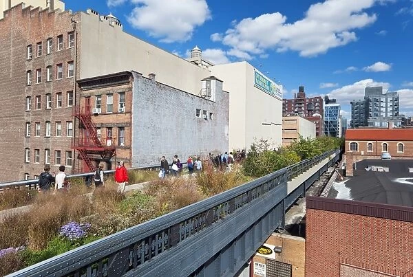 People walking on the High Line, a one-mile New York City park, New York