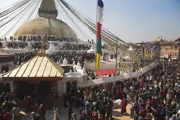 People walking round base of stupa during Lhosar