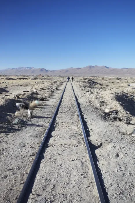 Framed Print : People walking along train tracks, Uyuni, Potosi Department, Bolivia, South America Framed Print : People walking along train tracks, Uyuni, Potosi Department, Bolivia, South America