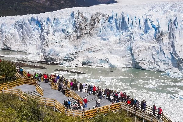 People on walkway at Perito Moreno Glaciar, Los Glaciares National Park, UNESCO World Heritage Site