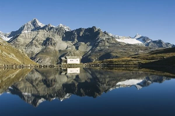 Perfect reflection in lake at Schwarzee Paradise