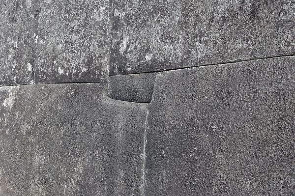 Detail of perfectly carved and fitted stone blocks similar to walls found in at Tiahuanaco in Bolivia and Inca sites in Peru, Ahu Tahira stone platform, Vinapu, Easter Island, Chile