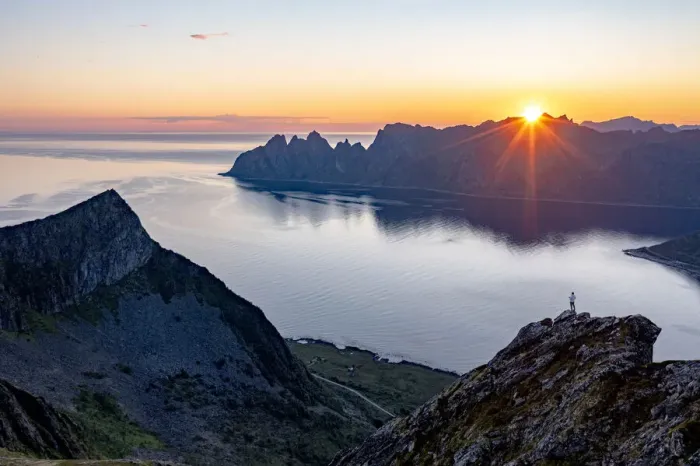 Framed Print : Person admiring the fjord at dawn standing on top of Husfjellet mountain, Senja island Framed Print : Person admiring the fjord at dawn standing on top of Husfjellet mountain, Senja island