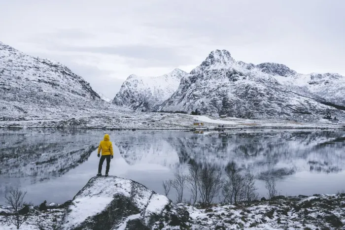 Framed Print : Person admiring the snowcapped mountains reflected in frozen sea, Flakstadpollen, Flakstadoya, Nordland, Lofoten Islands, Norway, Scandinavia, Europe Framed Print : Person admiring the snowcapped mountains reflected in frozen sea, Flakstadpollen, Flakstadoya, Nordland, Lofoten Islands, Norway, Scandinavia, Europe