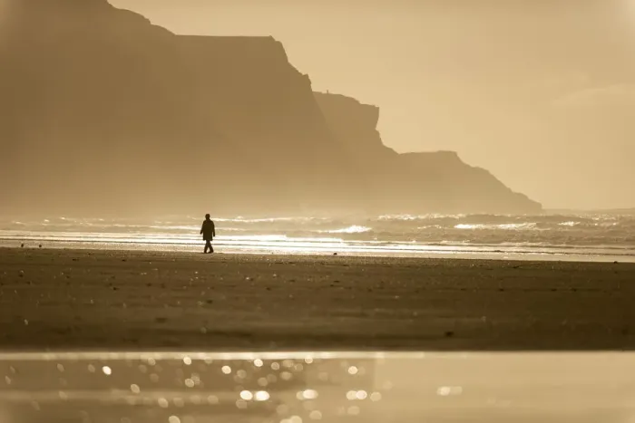 Framed Print : Person walking along beach in the evening sunlight, Rhossili, Gower Peninsula, Swansea Framed Print : Person walking along beach in the evening sunlight, Rhossili, Gower Peninsula, Swansea