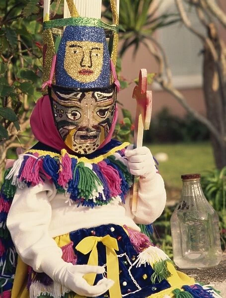 Person wearing mask, Gombey, Bermuda, Central America