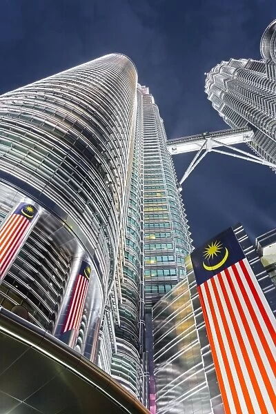 Petronas Towers and Malaysian national flag, Kuala Lumpur, Malaysia, Southeast Asia, Asia