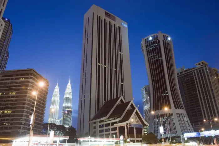 Framed Print : Petronas Towers and Tabung Haji Building, designed by Hijas Katsuri, Kuala Lumpur Framed Print : Petronas Towers and Tabung Haji Building, designed by Hijas Katsuri, Kuala Lumpur